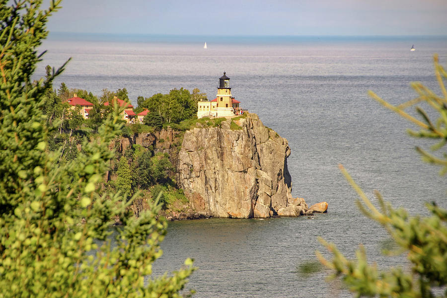 Lighthouse on the Rock Photograph by Laura Smith