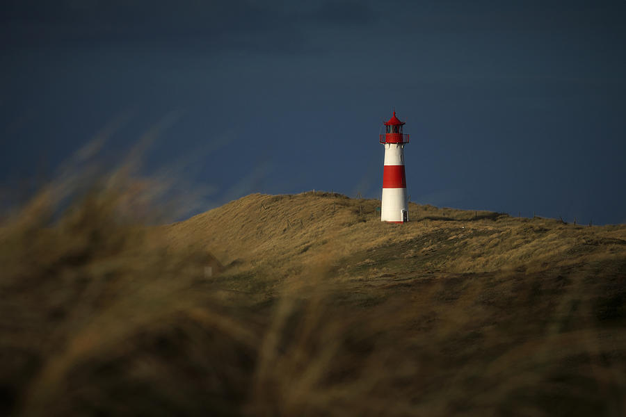 Lighthouse Shines In The Sunlight Photograph by Bodo Balzer