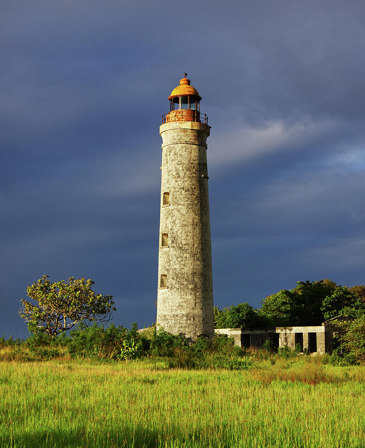 Lighthouse with dark sky Photograph by Guy Roberts - Fine Art America