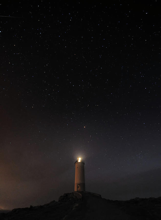 Lighthouse With Starry Sky Photograph by Carlos Fernandez