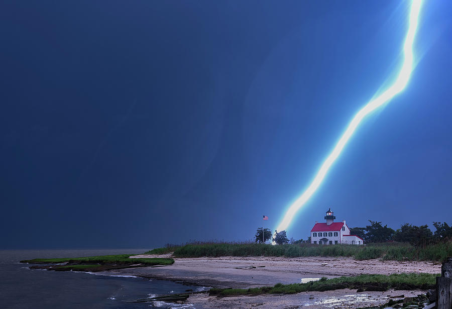 Lightning at East Point Lighthouse Photograph by Bruce Neumann Fine