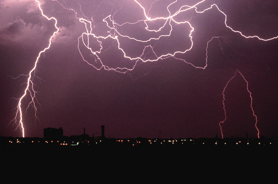 Lightning Over City Photograph by John Foxx