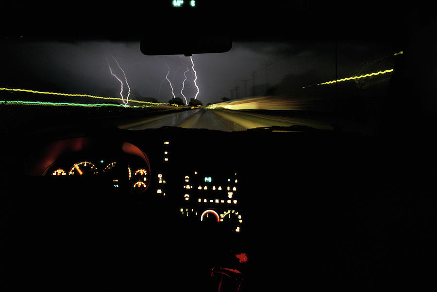 Lightning Storm As Seen Through Car Photograph by Paul Souders