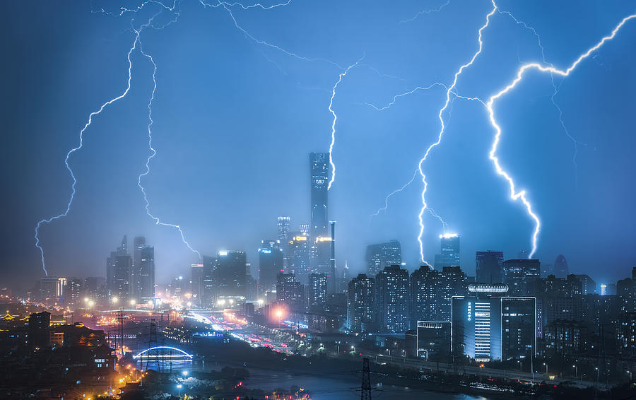 Lightning Storm Over The City Photograph by Yuan Cui