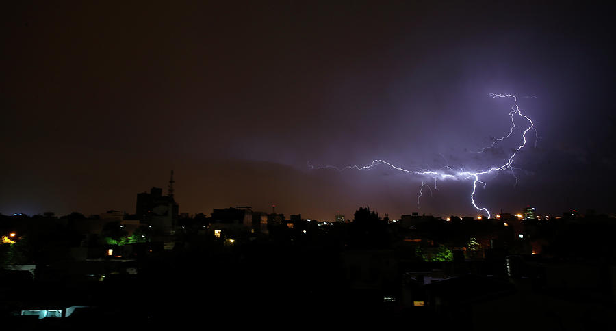 Lightning Strikes over Villa Urquiza Photograph by Marcos Brindicci ...