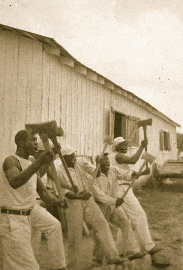 Lightning Washington, an African American prisoner, singing with his group in the woodyard at Darlington State Farm, Texas Painting by Unknown