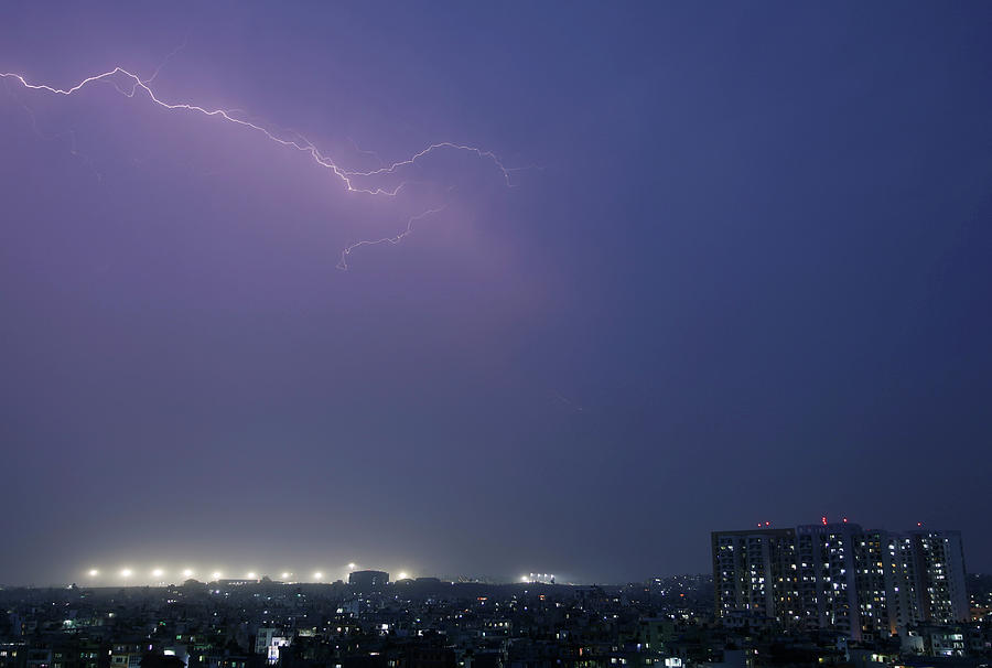 Lightnings Strike over an Apartment Photograph by Navesh Chitrakar ...