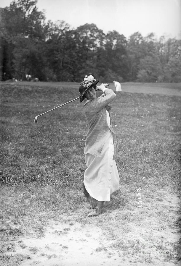 Lillian Hyde Swings Golf Club Photograph by Bettmann