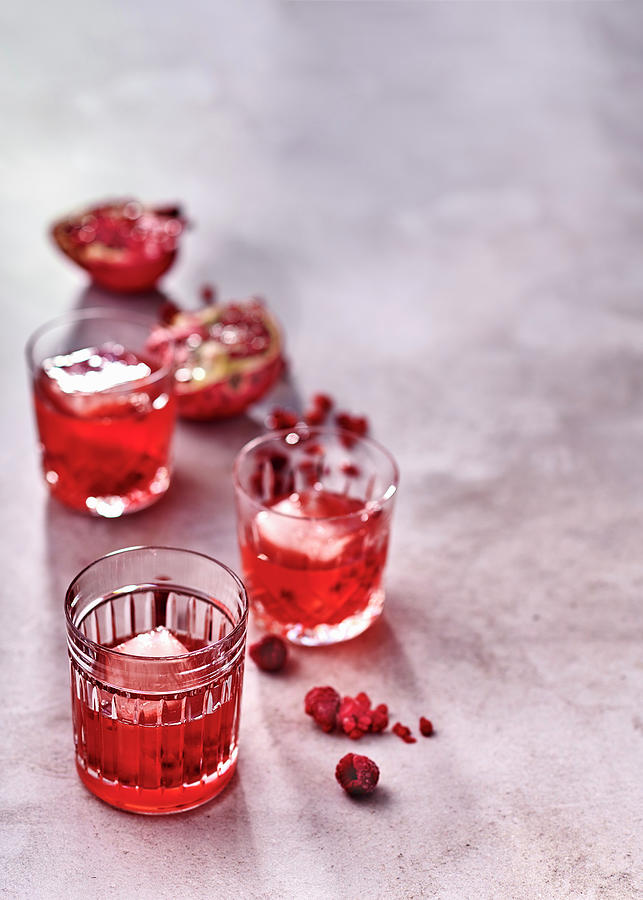 Lime, Pomegranate And Raspberry Whisky Sours Photograph by Great Stock!