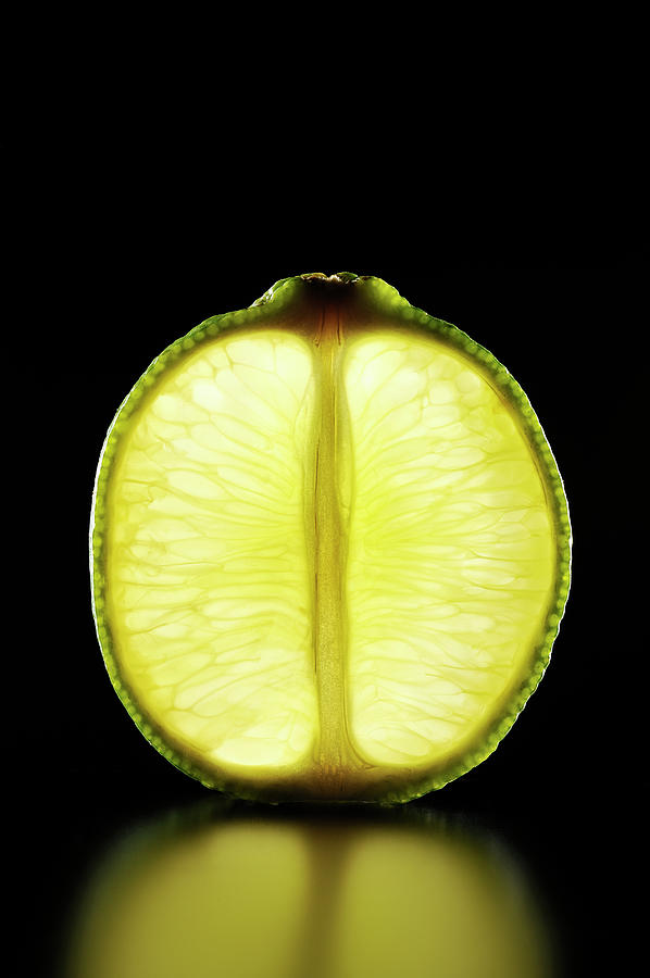 Lime Slice Is Illuminated Black Photograph by Yagi Studio