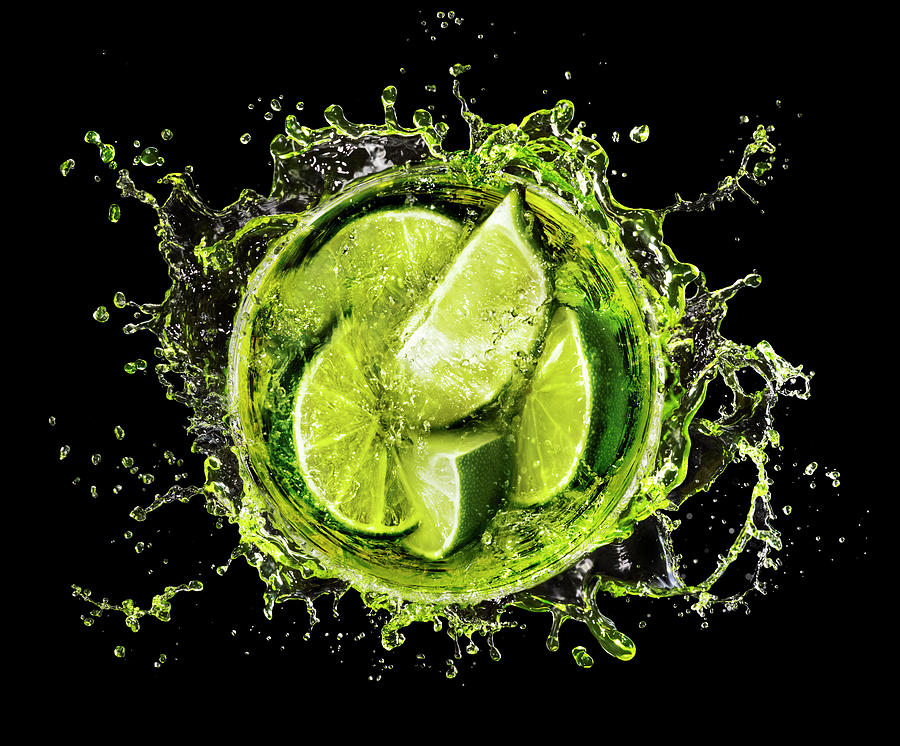 Lime Splash Into Cocktail Glass Photograph by Stilllifephotographer