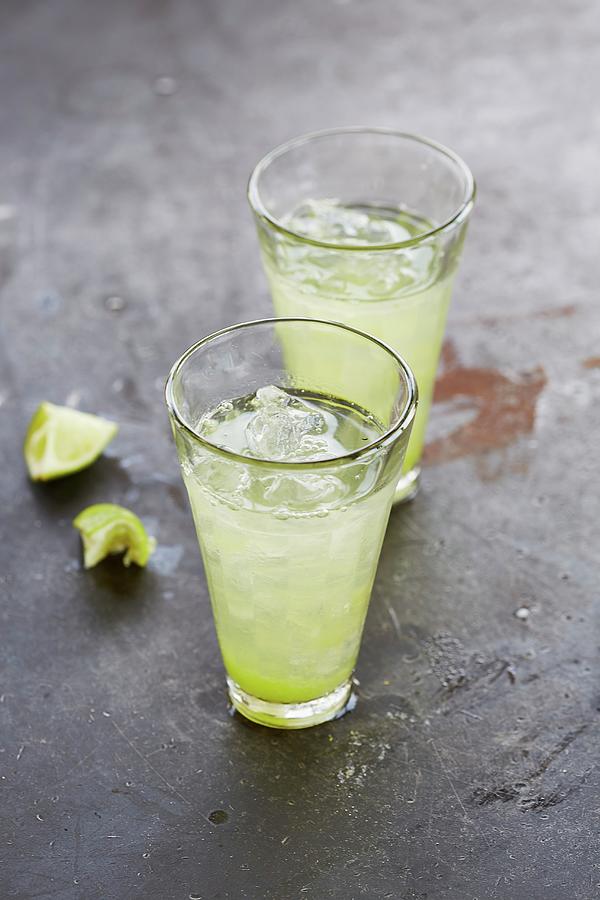 Lime Water With Ginger And Crushed Ice Photograph by Rafael Pranschke