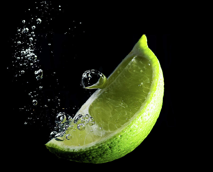 Lime Wedge And Bubbles Photograph by Ict photo