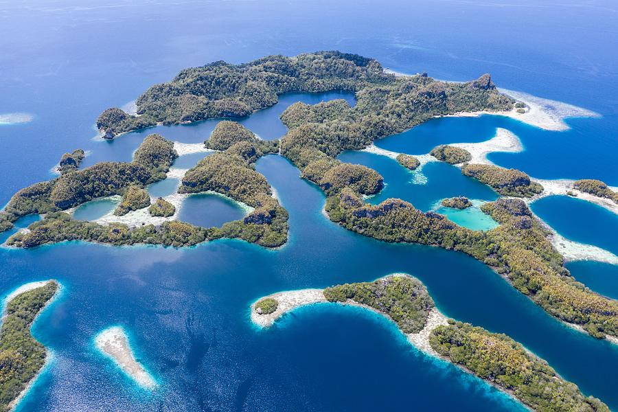 Limestone Islands Are Surrounded Photograph by Ethan Daniels - Fine Art ...