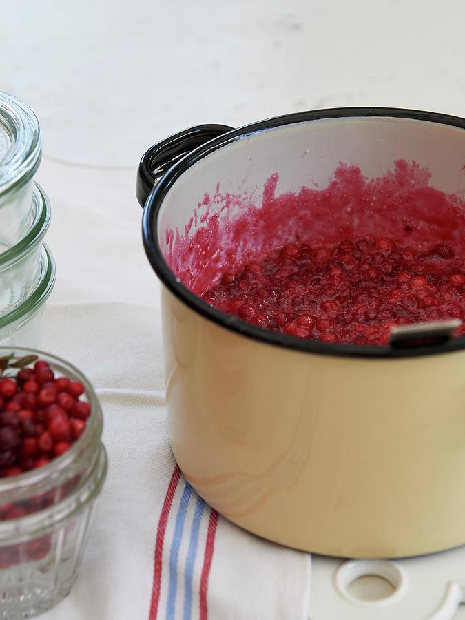 Lingonberry Jam In A Saucepan Photograph by Hannah Kompanik