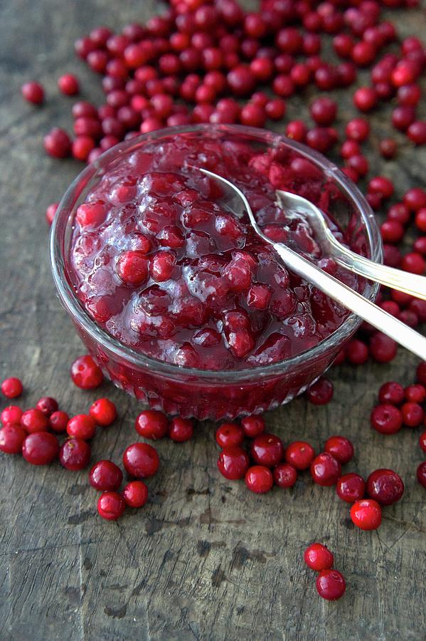 Lingonberry Sauce In A Glass Bowl Photograph by Martina Schindler