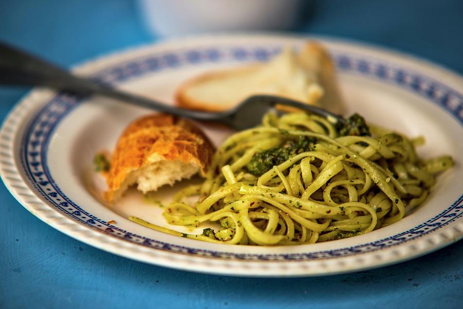 Linguine With Almond Pesto And White Bread Photograph by Roger Stowell