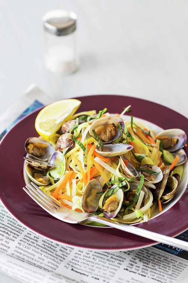 Linguine With Clams And Vegetables Photograph by Jan Wischnewski