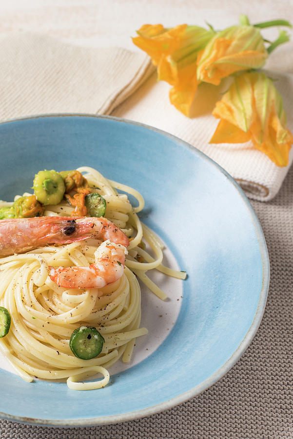 Linguine With Shrimps And Courgette Flowers Photograph by Di Baldassare
