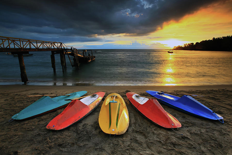 Lining Colorful Boats And Sunset In Photograph by Ali Trisno Pranoto
