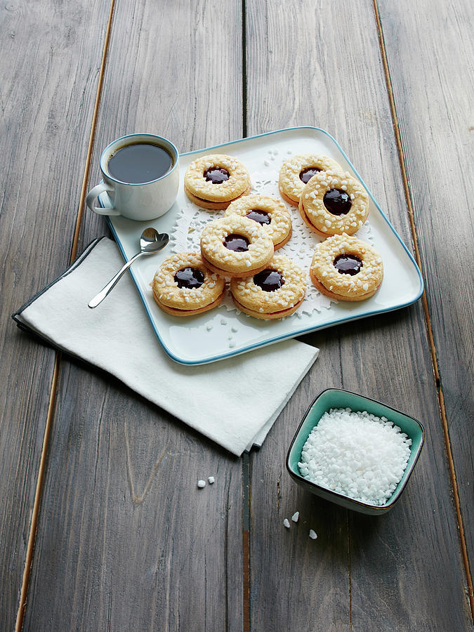 Linzer Pltzchen nutty Shortcrust Jam Sandwich Biscuits With Holes On Top With Sugar Nibs Photograph by Rafael Pranschke