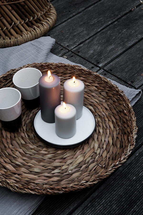 Lit Candles And Beakers On Wicker Tray Photograph by Hej.hem Interior