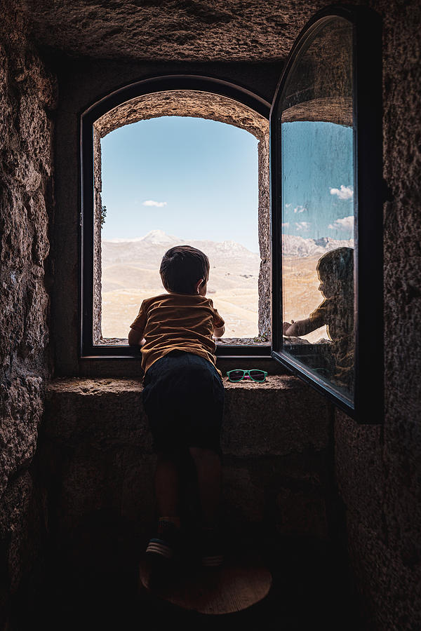 Little Boy At The Window Photograph by Marco Tagliarino