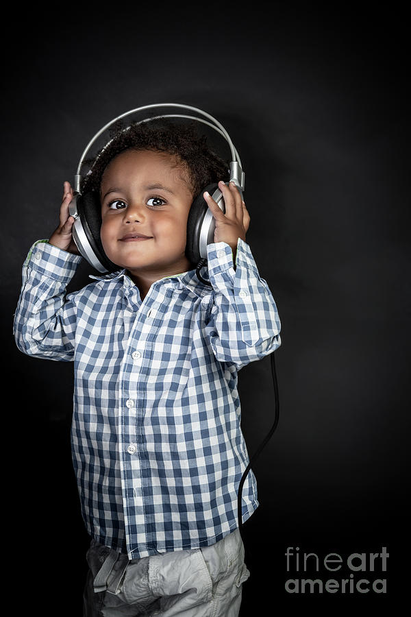 Little boy listens music Photograph by Anna Om