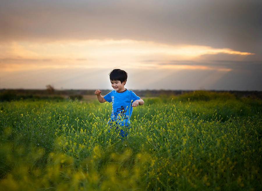 Little Boy Running In A Field Photograph by Sweetpeatoad