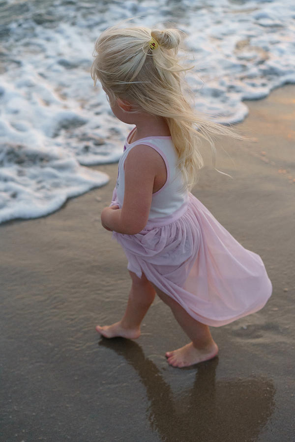 Summer Photograph - Little Girl On The Beach In The Summer. by Cavan Images