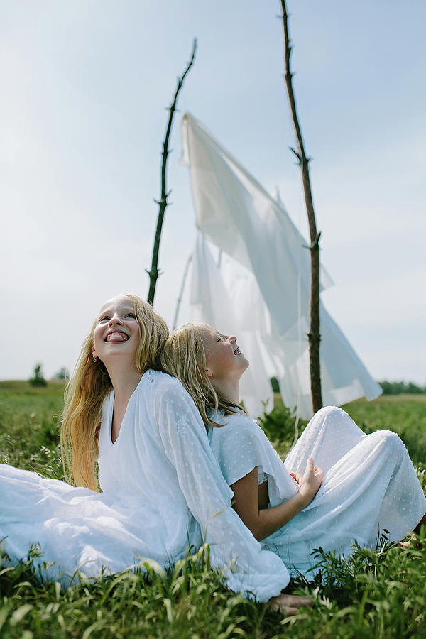 Summer Photograph - Little Girls Enjoy Summer Carefree by Cavan Images