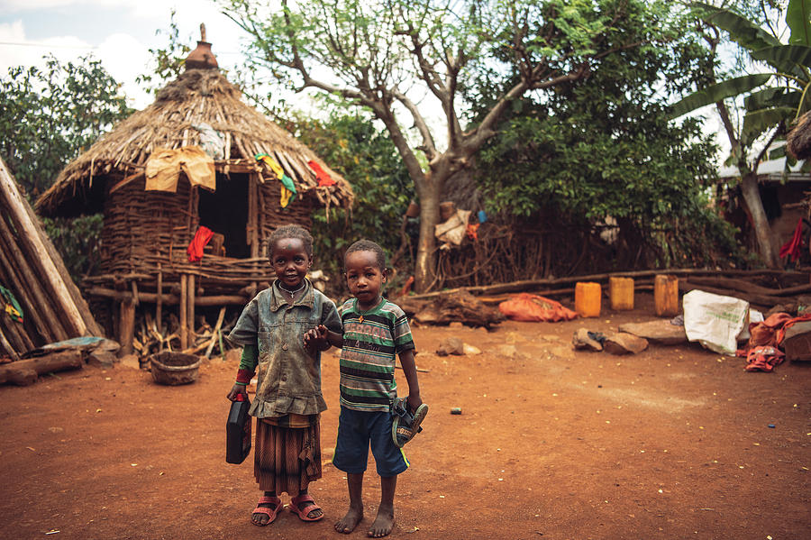 Little kids of Konso tribe in rural land Photograph by Eduardo Huelin ...