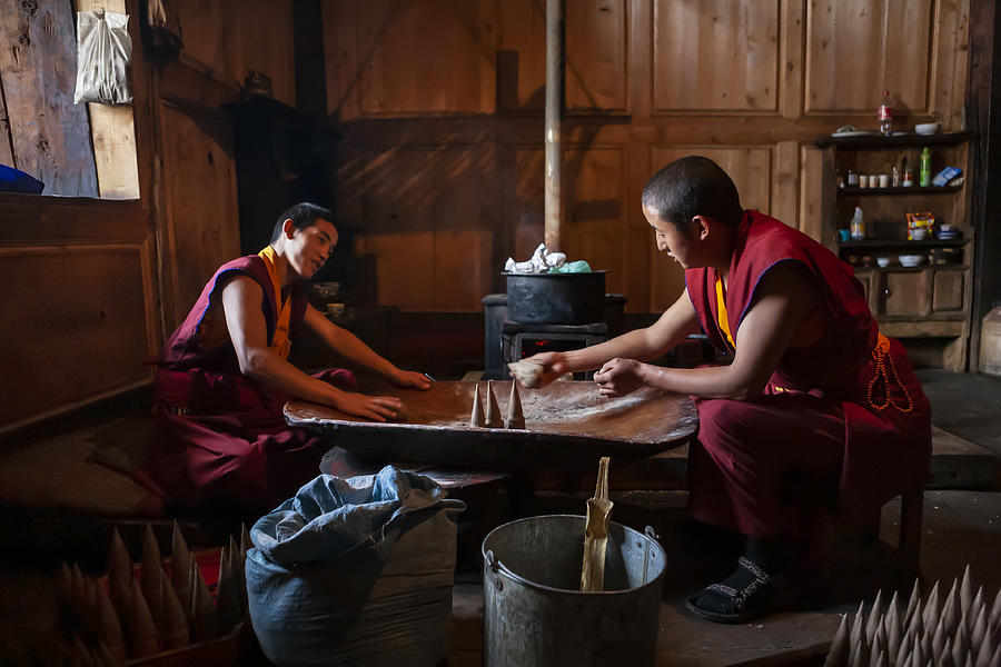 Tibetan Photograph - Little Lama Making Sacrificial Offerings by Yibing Nie