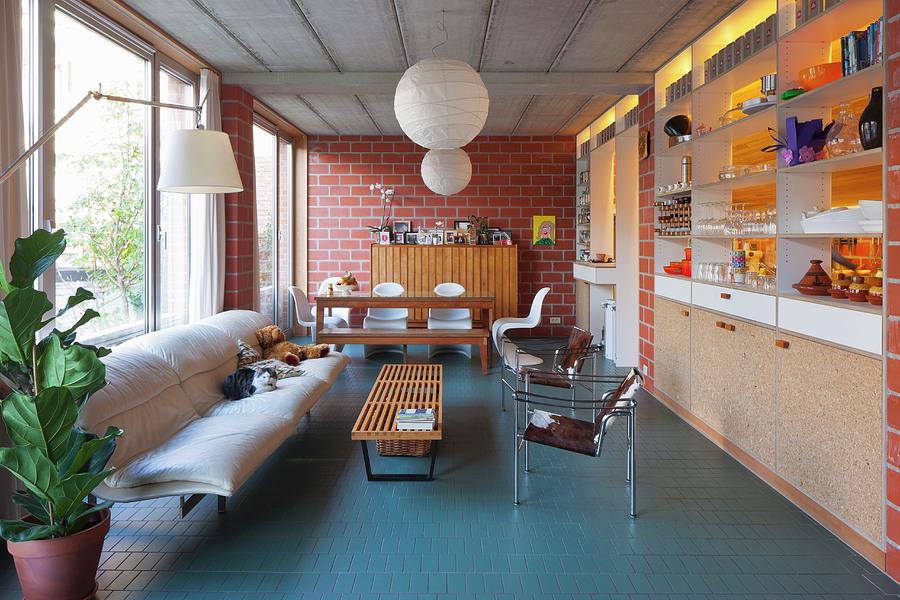 Living Room With Brick Walls In Industrial Loft Apartment Photograph by Liesbet Goetschalckx