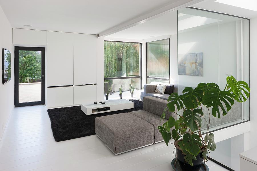 Living Room With Glass Walls In Modern Building Photograph by Liesbet Goetschalckx