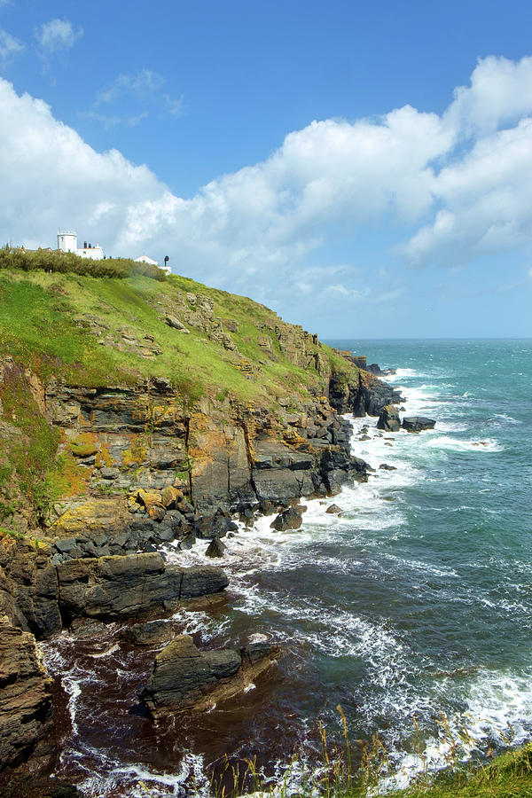 Lizard Lighthouse on the cliffs at Lizard Point in the Lizard Pe Photograph by Seeables Visual Arts