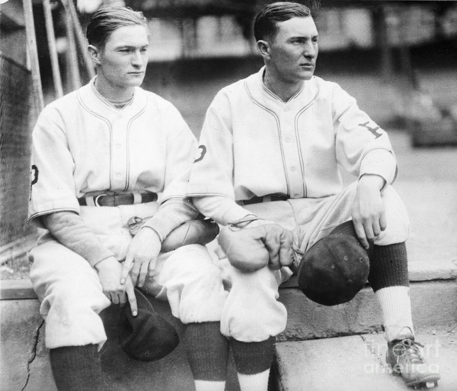 Lloyd And Paul Waner Seated In Uniform Photograph by Bettmann