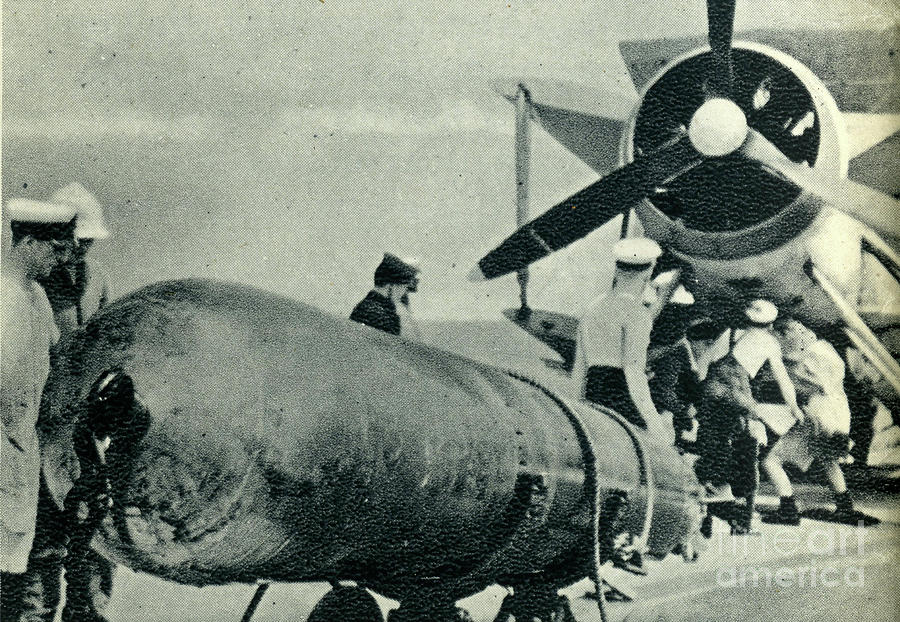 Loading A Torpedo Under The Fuselage Of A Fairey Swordfish On Board Hms ...