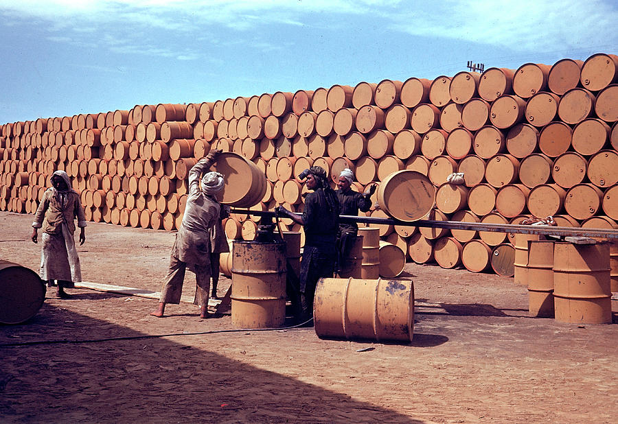 Transportation Photograph - Loading Oil Drums by Dmitri Kessel