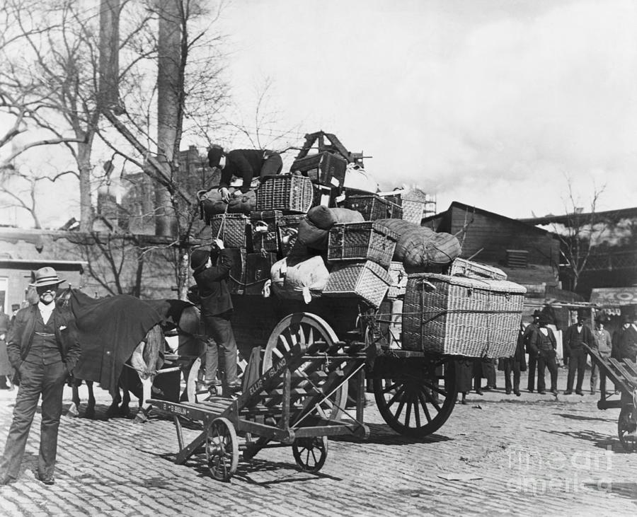 Loading Possesions Onto Horse Cart In Ny Photograph by Bettmann