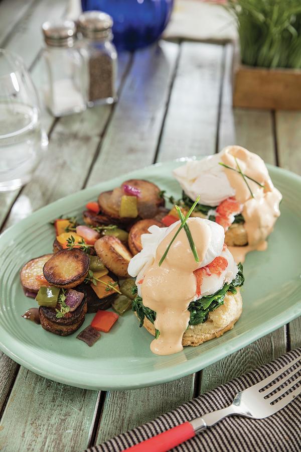 Lobster Benedict With Poached Eggs, Spinach, Buttermilk Biscuits And Creole Hollandaise Photograph by Cindy Haigwood