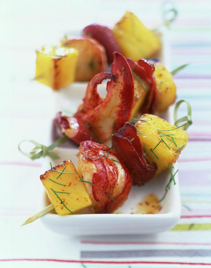Lobster, Duck Magret And Pineapple Skewers Photograph by Roulier-turiot