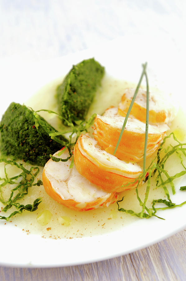 Lobster In Potato Sauce With Spinach Dumplings Photograph by Franco Pizzochero