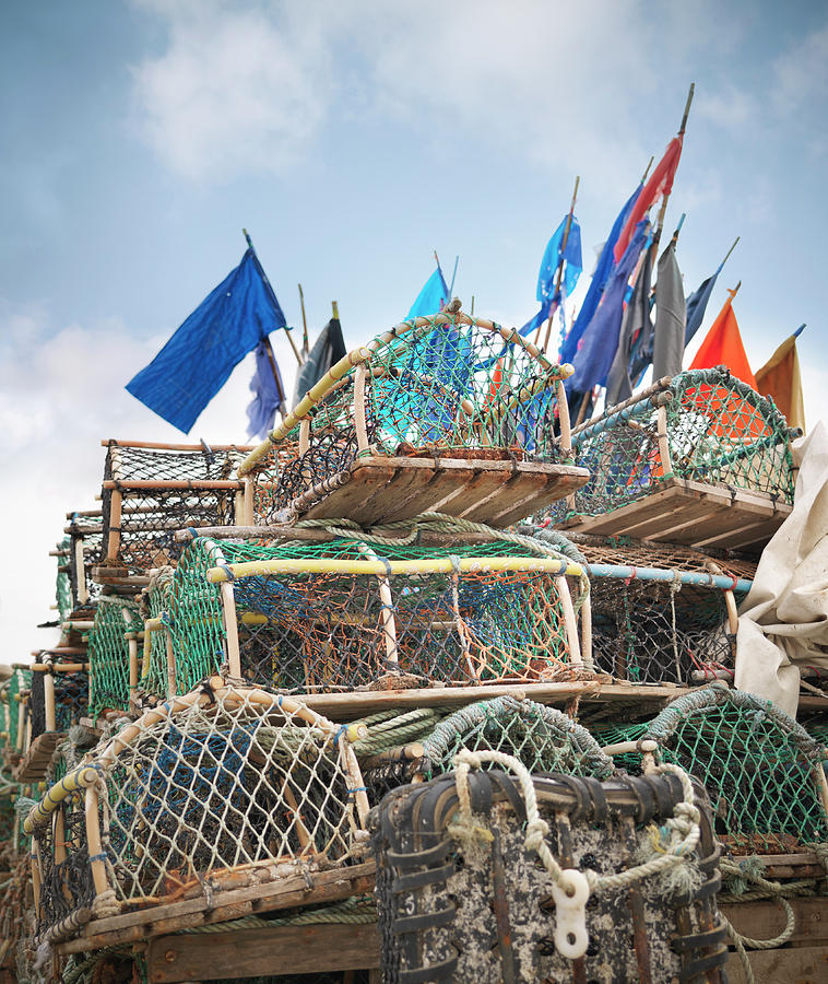 Lobster Pots With Flags On Deck Photograph by Monty Rakusen