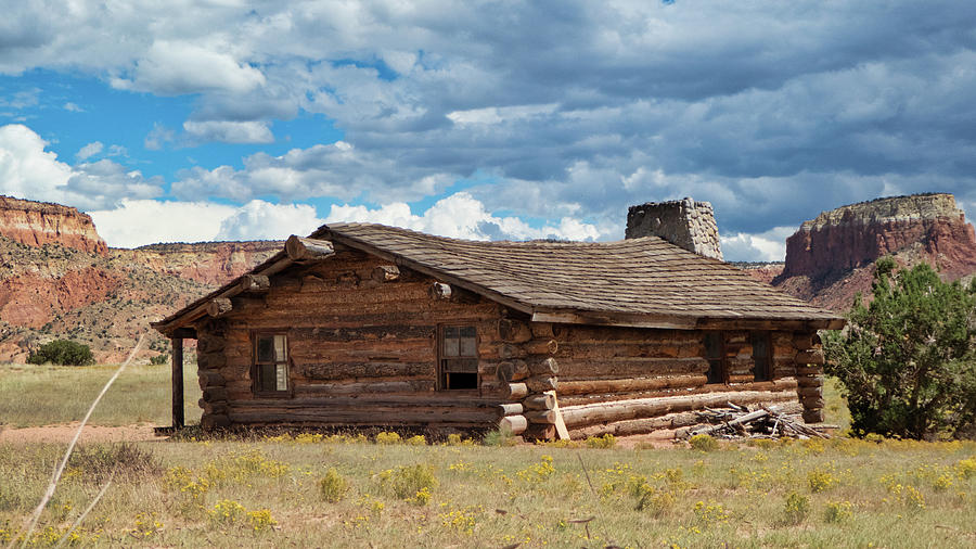 Log cabin at Ghost Ranch, Abiquiu NM Photograph by Segura Shaw Photography