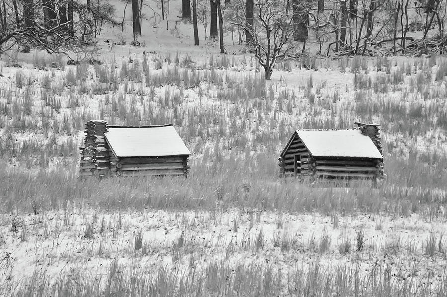 Log Cabins at Valley Forge - Black and White Photograph by Bill Cannon