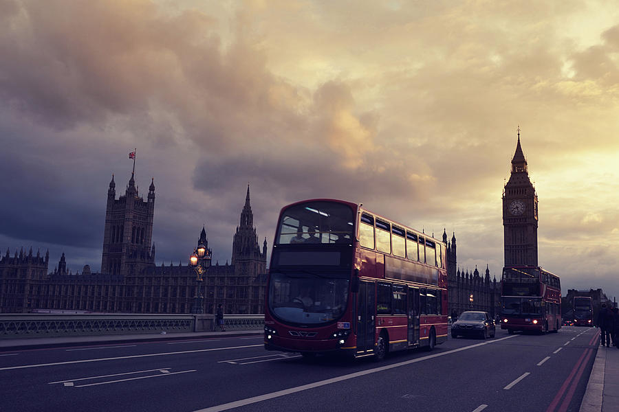 London Buses Pass The Big Ben Photograph by Bryan Leung