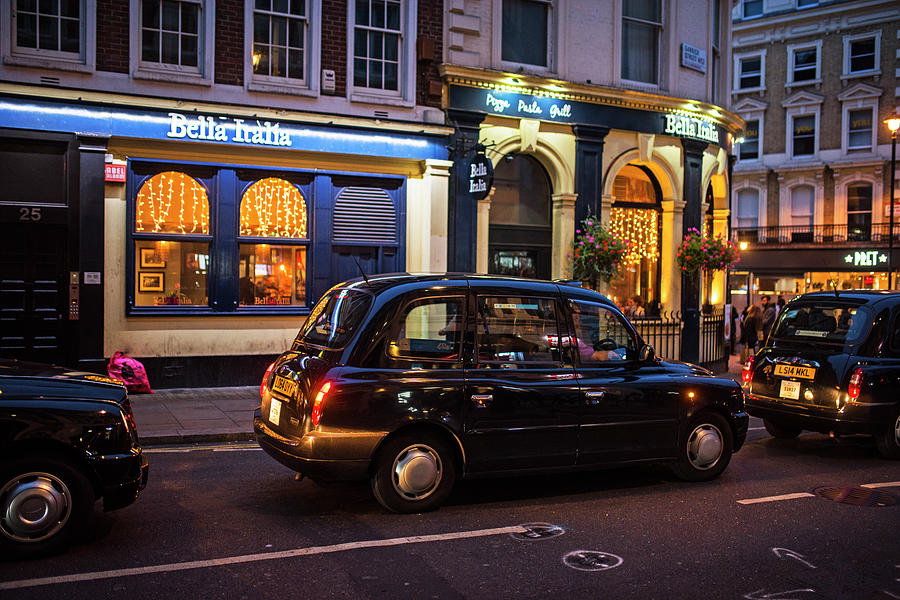 London Taxis at Night London UK United Kingdom Photograph by Toby McGuire