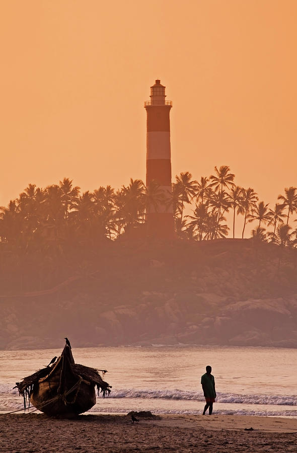 Lone Person Walking Along Lighthouse Photograph by Anders Blomqvist Lone Person Walking Along Lighthouse Photograph by Anders Blomqvist