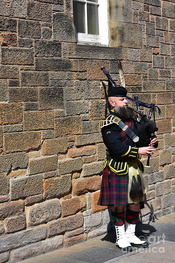 Lone Piper, The Royal Mile Photograph by Yvonne Johnstone